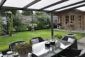 Terrassendach Premium XL - Beispielbild - Blick in den Garten-thumbnail